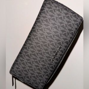 a Michael korse clutch purse